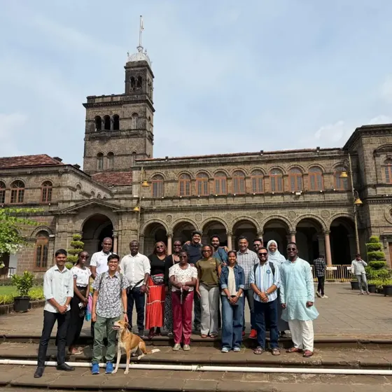Exchange participants outside a university building during the India visit