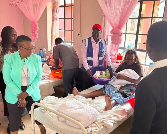 Members distribute mother packs in the ward