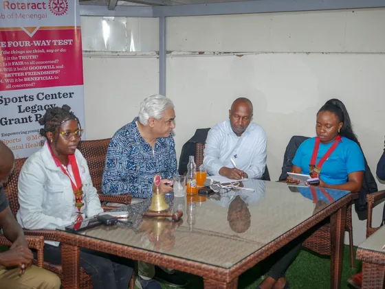 Rotaractors gathered with the District Governor during the Nakuru Region meeting