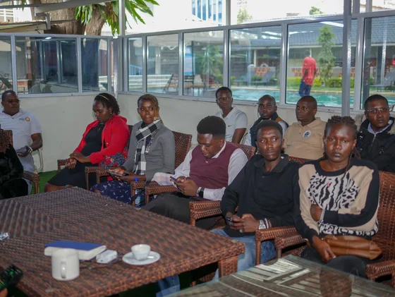 Rotaractors gathered with the District Governor during the Nakuru Region meeting