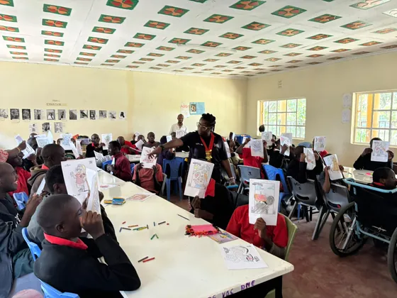 Learners show the drawings they made