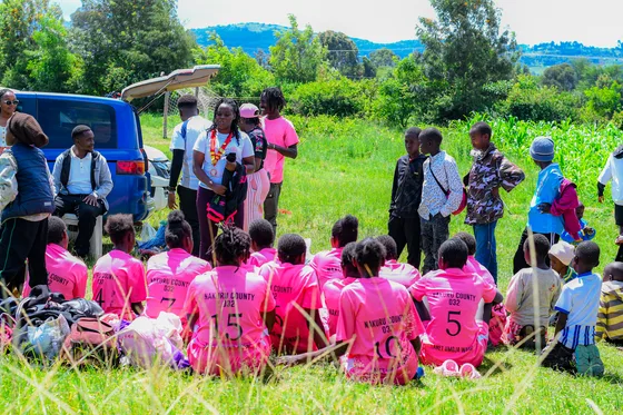 Young participants seated during a Sports Legacy address
